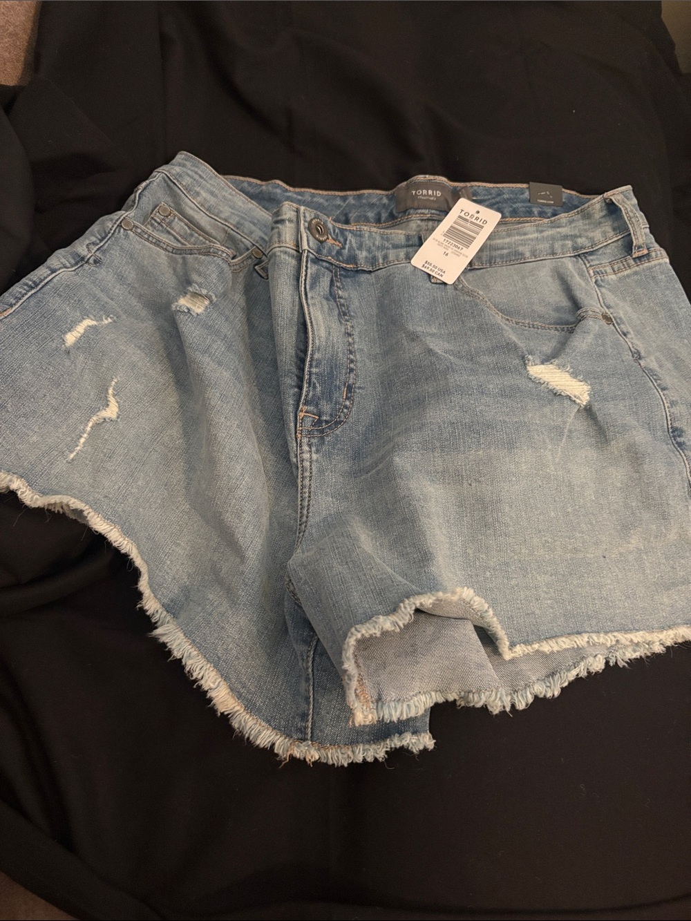 torrid light wash distressed denim cut-off shorts